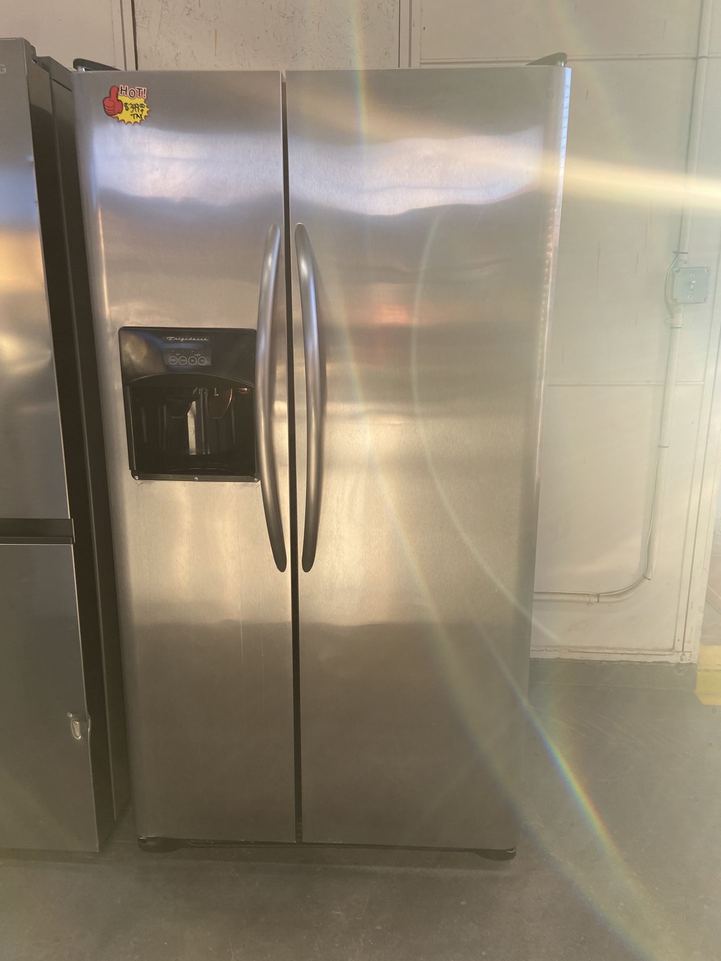 FRIGIDAIRE STAINLESS STEEL SIDE BY SIDE REFRIGERATOR