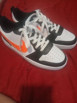 Nike. Black, white, & orange.
