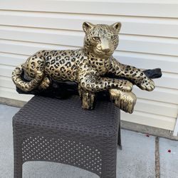 Leopard On The Log Statue 