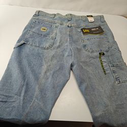 Size 34 X 39 Lee Men's Carpenter Jeans in a light wash blue denim