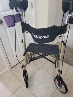 Oasis space upright mobility walker with seat