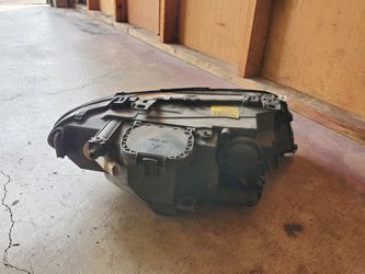 2004 bmw 325ci left headlight