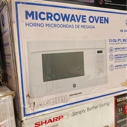 GE 1.1 cu. ft. Countertop Microwave in White