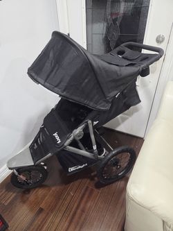 Joovy Zoom360 Ultralight Jogging Stroller Featuring High Child Seat, Shock-Absorbing Suspension, Extra-Large Air-Filled Tires, Parent Organizer, Air P