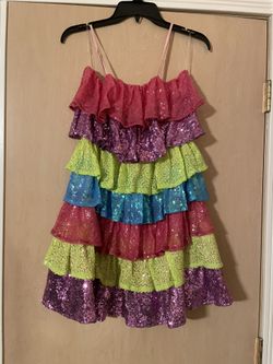 Brand new with tags adorable multi colored sequin ruffled dress.  Size small   Super cute 