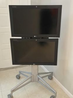 Qty. 2 - 32 Inch LG monitors Model M3203CCBA. With LG Smart Remote.  Portrait Or Landscape Display