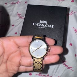Coach women’s gold watch