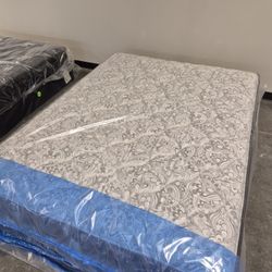 BRAND NEW MATTRESS- STILL IN FACTORY PLASTIC
