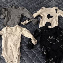 Carters New Born oneseis Bay Girl