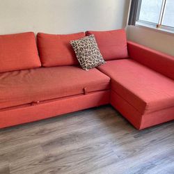 Red L Shaped Couch With Pull Out Leg Rest 