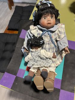 Porcelain Doll With Her Babydoll