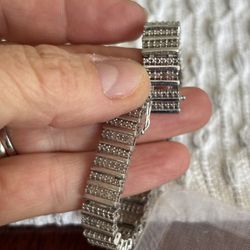 multilayered tennis bracelet set in sterling silver