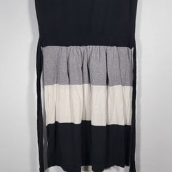 Vintage Black Sleeveless Dress with Striped Skirt – Size 7
(Compare $60)