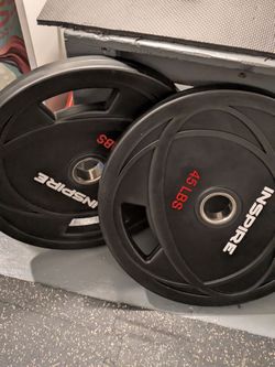 New Inspire 45 lb plates two of them set Olympic