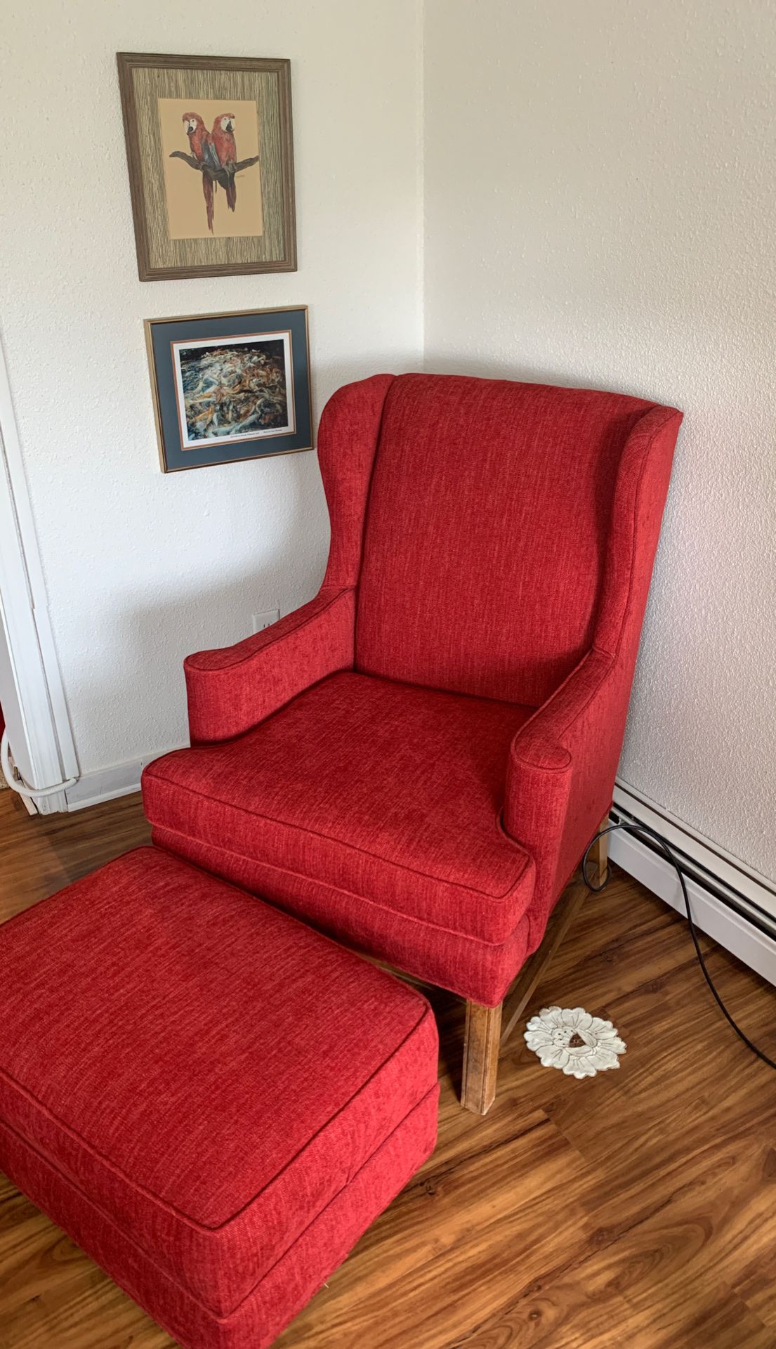 Red wingback chair with ottoman