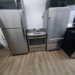 slide in stove kitchen aid botton freezer with ice  maker..$1200