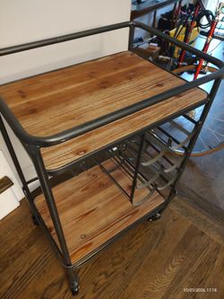 Wood kitchen cart with steal frame, wine rack and 4 wheels
