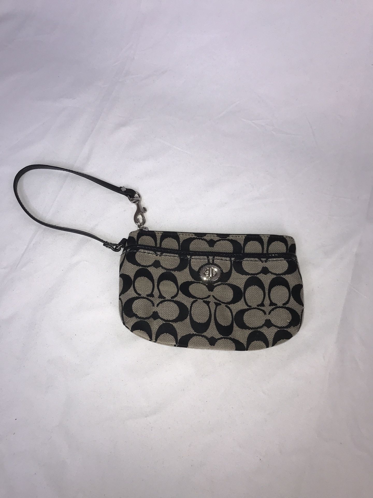 PREOWNED COACH GREY BLACK WRISTLET Gently used.