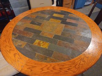 Tall round table and two chairs $75 obo