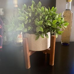 cute fake plant with stand