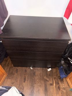 Brown wooden dresser drawer. Medium size.
