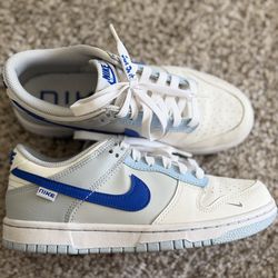 USED- BLUE AND WHITE NIKE DUNKS SZ 5.5Y