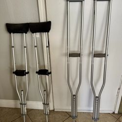 Two pairs of underarm  crutches