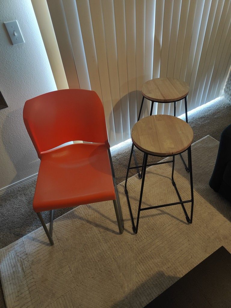 2 Bar Stools And A Bright Orange Chair (Does Not Have To Be Sold Together)