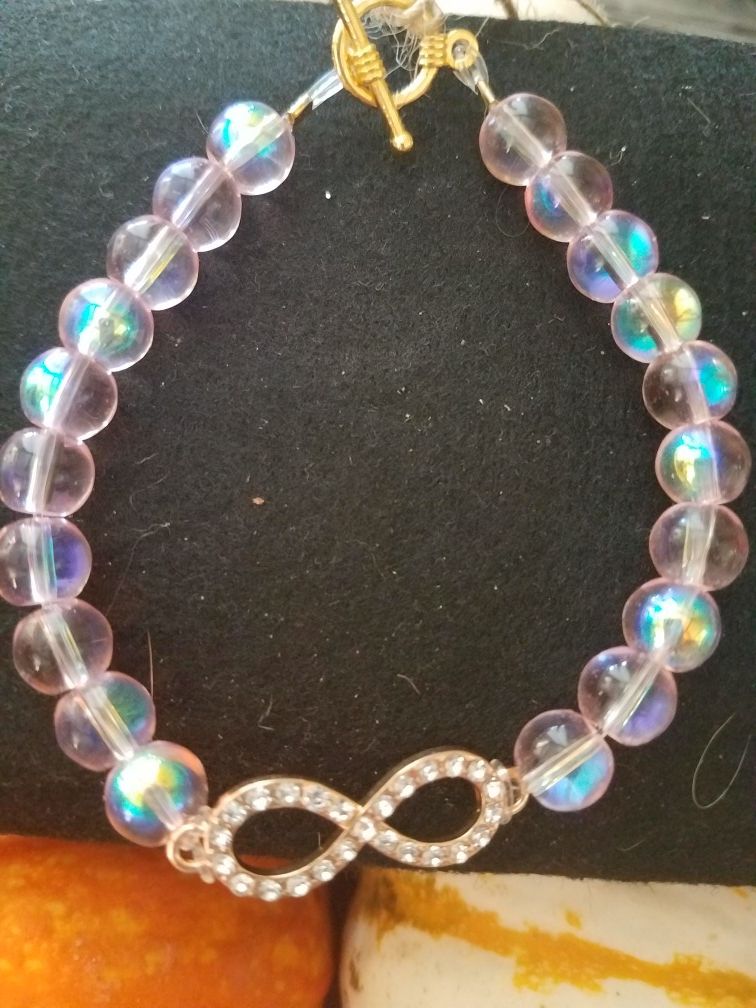 Infinity charm bracelets. 7.5". $12/each