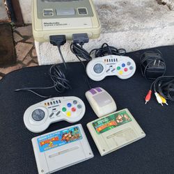 2 Controller 1 Mouse. 1990 Retro Famicom Nintendo. With 2 Games either Donkey king 1 & 2 or Street fighter 2 & pro wrestling game. $260 firm or Trade 