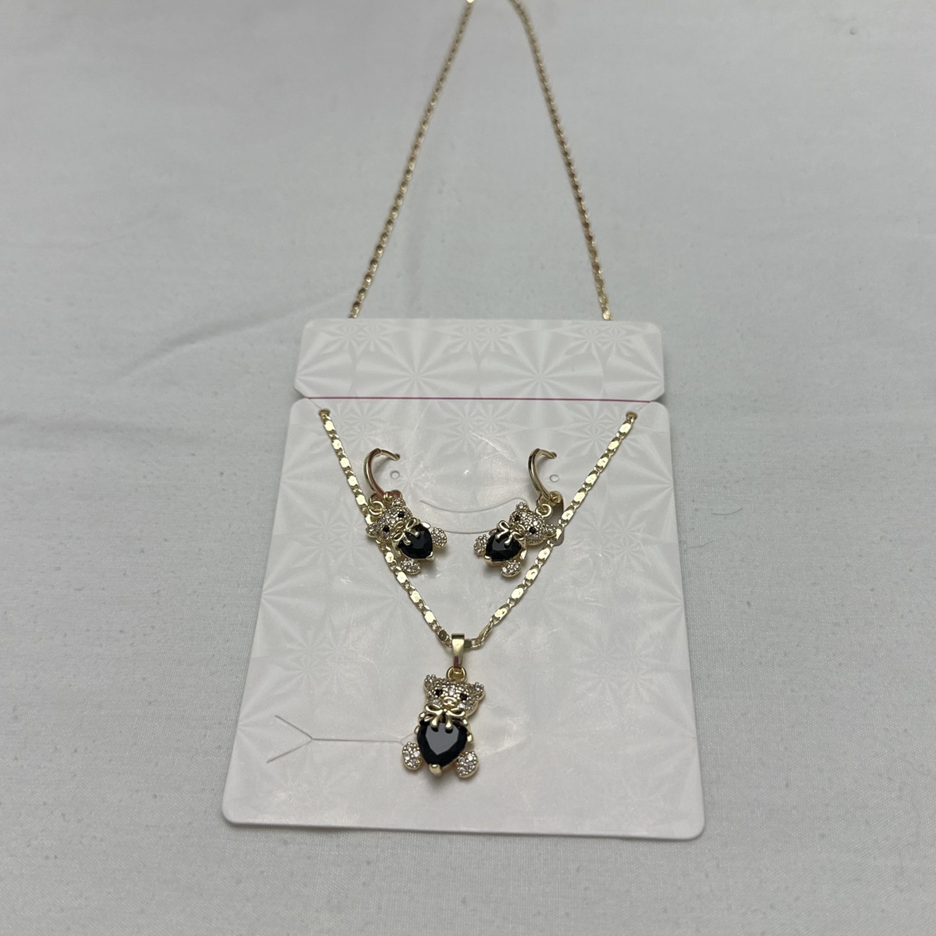 14 K Gold Plated Chain And earrings.