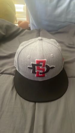 They and black Aztec hat
