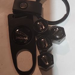 Jaguar key chain and 4pc valve stem cap set. 