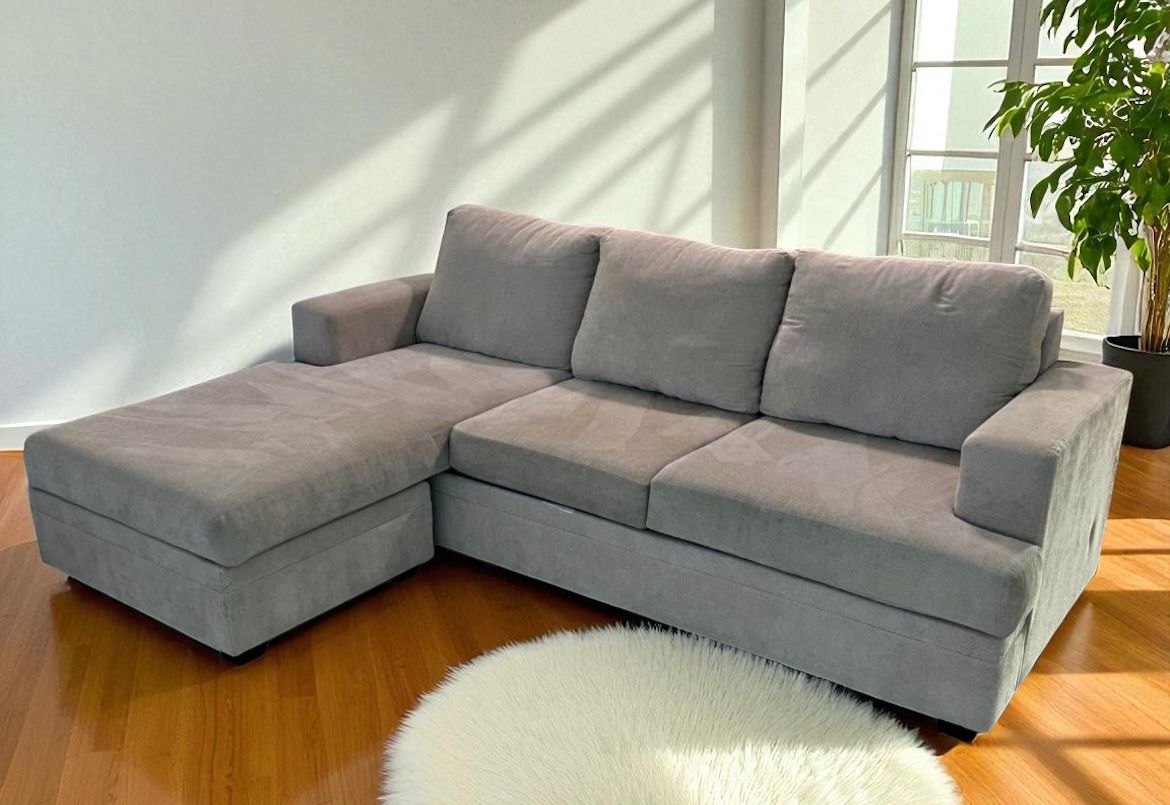 Living Spaces Beige Sectional With Reversible Chaise