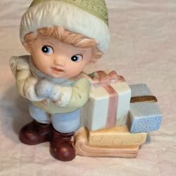 Homco Figurine #5556 Boy With Sled & Packages