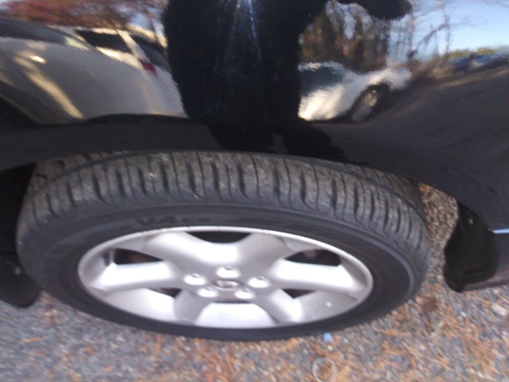 Rims and tires ...nissan maxima 17inch rims