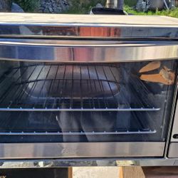 Oster Toaster Oven, 7-in-1 Countertop Toaster Oven, 10.5" x 13" Fits 2 Large