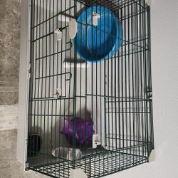 small animal cage with accessories