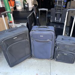 Assorted Suitcases. 