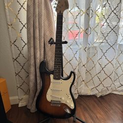 Awesome Guitar Fender Squier Stratocaster Affinity Series with Guitar stand, belt, and travel cover