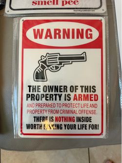 2 metallic signs
