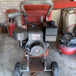 A Tomahawk, Wood Chipper And Shredder