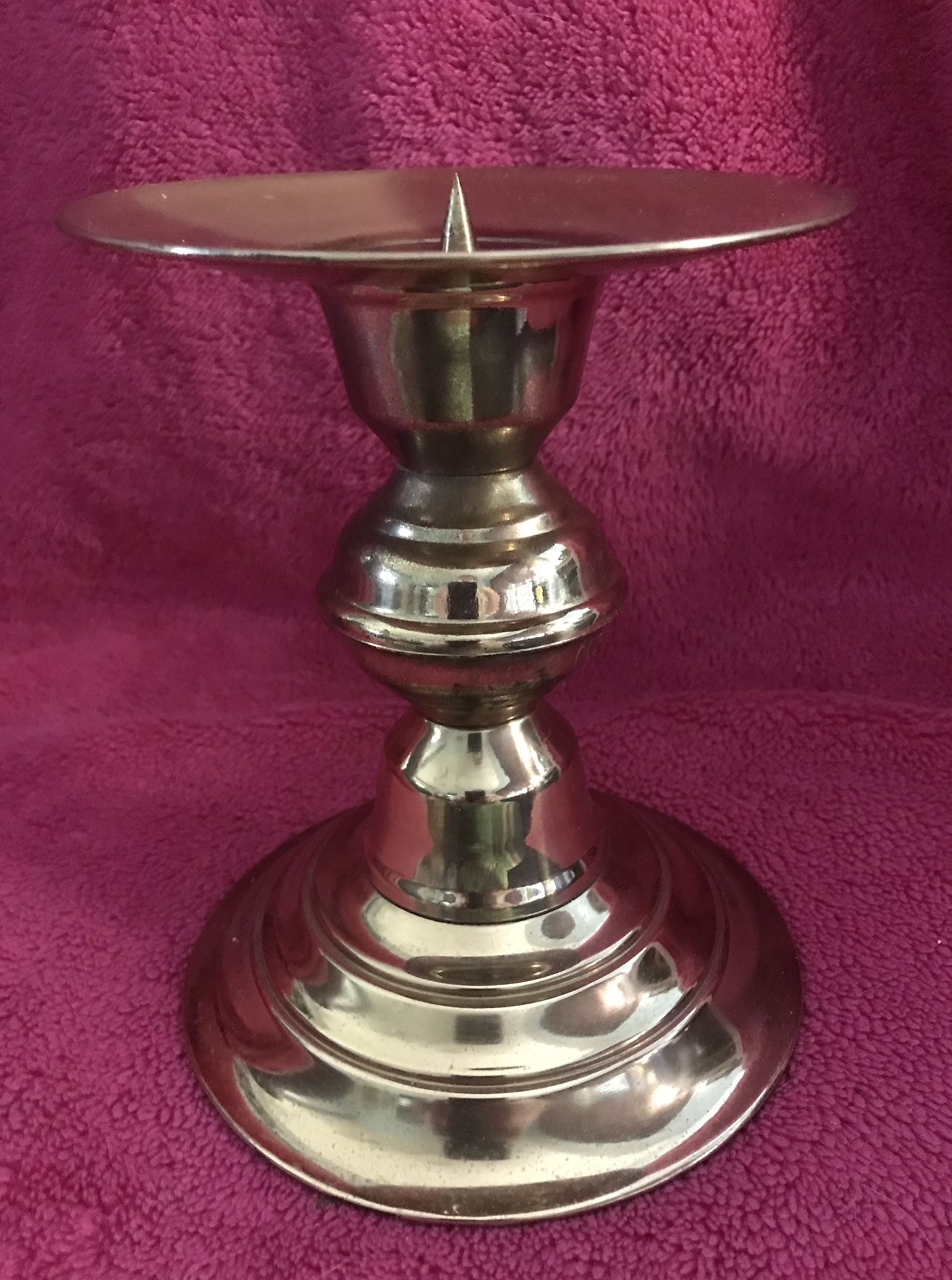 Brass Colored Pillar Candle Holder 7”high x 5 1/2”round