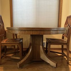 Antique dining table and chairs