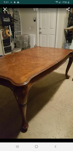 Kitchen table and 8 matching chairs