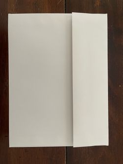Silver lined white envelopes (6 1/16” x 8 1/16”)