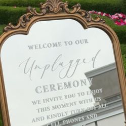 Unplugged ceremony sign with gold easel