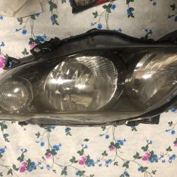 Toyota Corolla Driver Side Headlight 