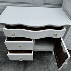White 3-drawer dresser w/ storage cabinet . Good condition. Measurement: 3-drawer w/ cabinet:  32 1/2L x 19 deep x 27H