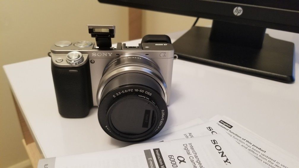 Sony a6000 with lens, battery, charger etc